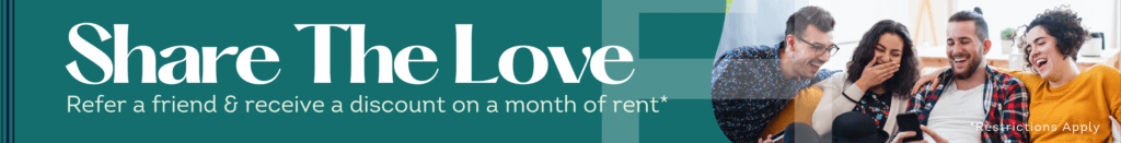 A group of five friends sit together laughing, next to text reading Share The Love at Flats at Neill Park. Refer a friend & receive a discount on a month of rent at these popular apartments in Burnsville MN. Restrictions apply.